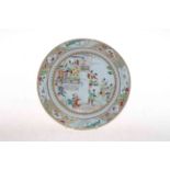 Chinese porcelain plate, profusely decorated with dignitaries on veranda with waving figures below,