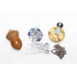 Silver topped scent bottle, treen acorn, two brooches and chain (5).