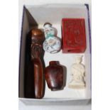 Five Chinese items, two scent bottles, figure, scoop and match box holder.