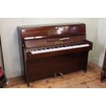 Zender rosewood upright overstrung piano. 106.5cm by 136.5cm.