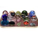 Collection of glass paperweights.