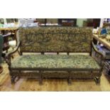 Impressive tapestry and carved frame sofa, the seat and back with country scenes with animals,