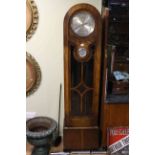 1930's oak triple weight longcase clock with silvered dial.