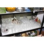 Large collection of cut glass and crystal including decanters, vases,