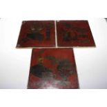 Three Chinese early cinnabar panels, 29cm by 29cm.
