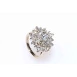 Impressive diamond cluster ring set in 18 carat gold,