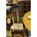 Pair antique high back side chairs with carved top rail and stretcher.