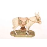 Royal Dux donkey, saddled and with blinkers, pink triangle and printed mark, 13cm.