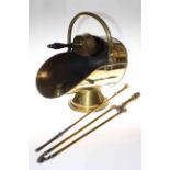 Highly polished brass swing handle coal scuttle with shovel and three fire irons.