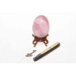 Onyx egg on stand, folding knife and keycharm (3).