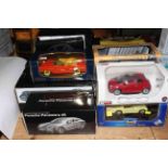 Collection of Diecast model cars in boxes including Revell, Neo, Solido, etc.