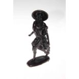 Black painted bronze Eastern figure, 22cm.