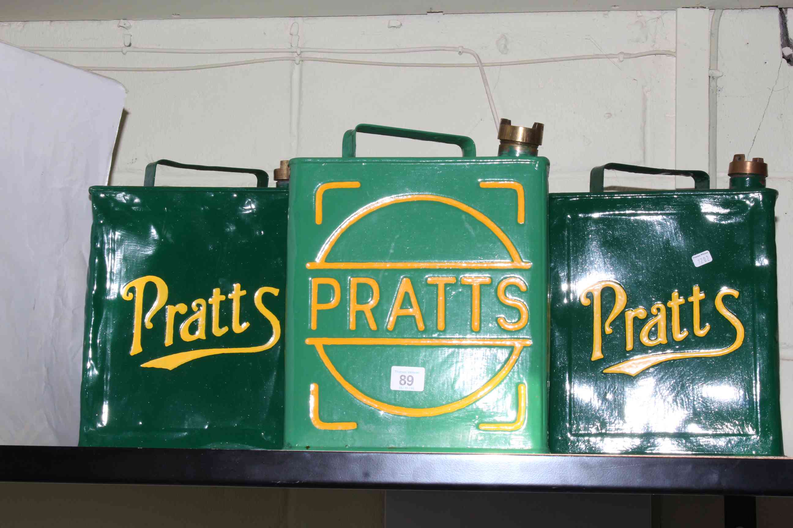 Three Pratt's petrol cans.