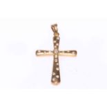 Diamond set matt gold cross pendant.