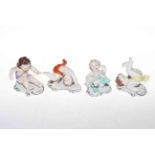 Set of four Continental cherub figures.