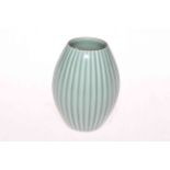 Chinese pale green celadon ribbed vase, impressed mark to base, 12cm.