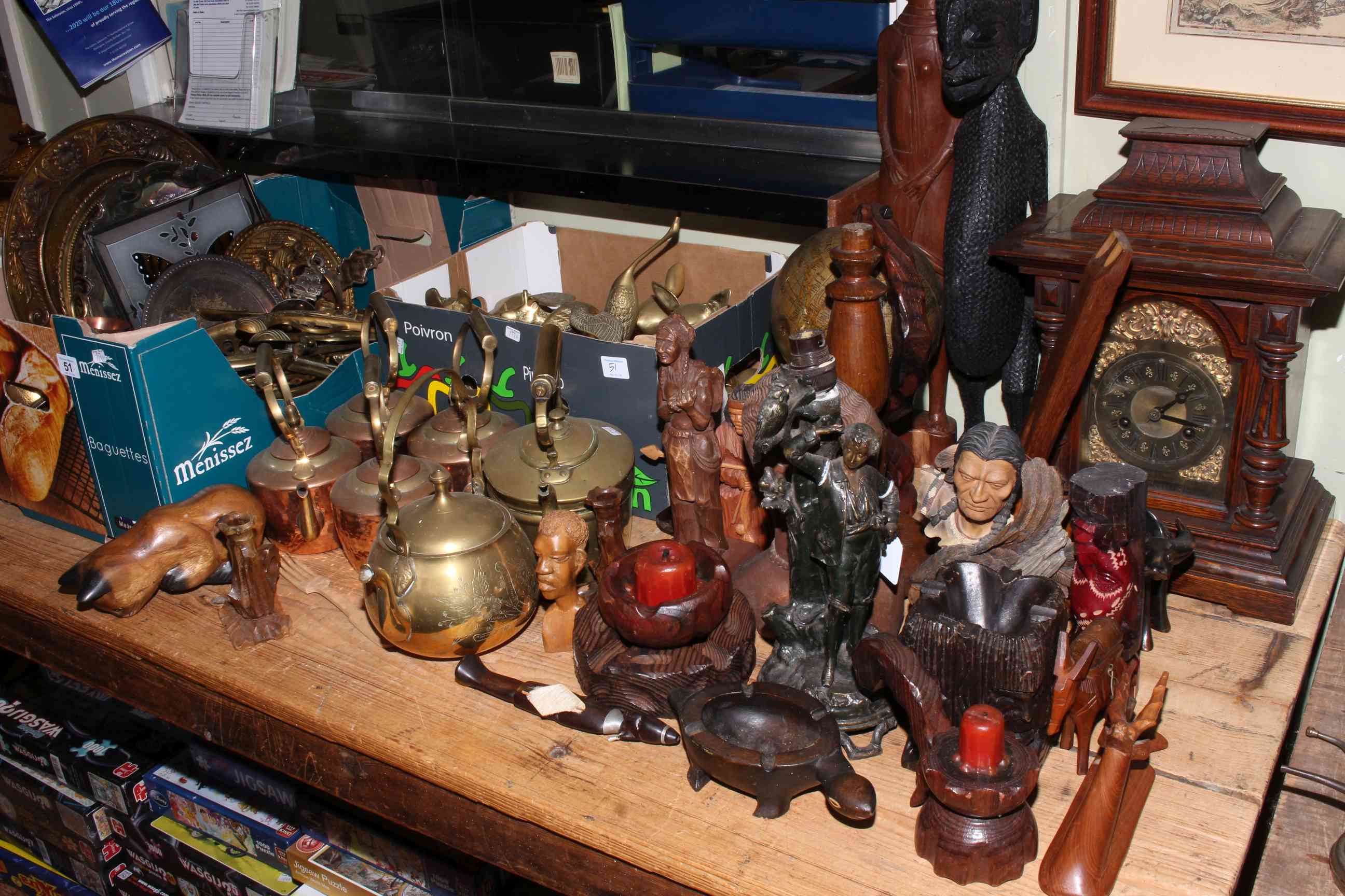 Assortment of brass, copper kettles, wall plaques, mantel clock, globe, tribal art, etc.