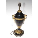 Victorian parcel gilt urn shaped oil lamp base converted to table lamp, having ring handles.