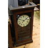 Oak cased wall clock with enamelled dial and fusee movement.