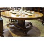 Huge and impressive burr wood circular dining table on centre column with platform base and claw