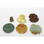 Collection of five Chinese jade roundel's and a Buddha (6).