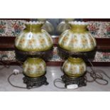 Pair of Victorian style lamps with painted glass shades.