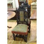 Pair Victorian carved oak hall chairs with tapestry upholstery.