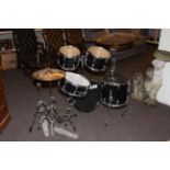 Tama five-piece drum kit with Zildjian hi-hats and Zildjian 20inch ride cymbal with Premier snare