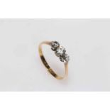 18 carat gold three stone diamond ring, size P.