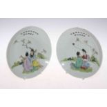 Pair Chinese porcelain saucer dishes, each painted with seated figures and calligraphy,