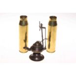 Pair small brass shell cases and a whale oil lamp.