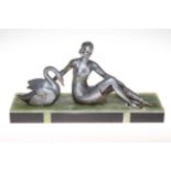 Art Deco Lady and the Swan, signed on green and black marble base.