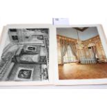 Album of Versailles prints.
