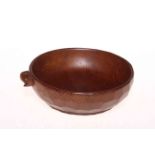 Robert Thompson 'Mouseman' circular nut bowl with adzed exterior, 15cm diameter.