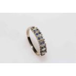 18 carat gold, sapphire and baguette diamond ring, size R/L.