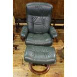 Ekornes, Norway, reclining chair and footstool in green leather.
