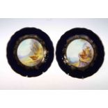 Pair of Royal Worcester porcelain plates painted with game birds by A. Shuck, blue and gilt borders.
