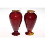 Pair of Linthorpe Pottery red and yellow glazed vases.