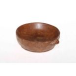 Robert Thompson 'Mouseman' circular nut bowl with adzed exterior, 14cm diameter.
