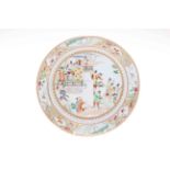 Chinese porcelain plate, profusely decorated with dignitaries on veranda with waving figures below,