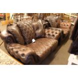 Pair Italian Rubelli brown buttoned leather two seater settees.