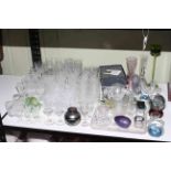 Collection of Waterford crystal bottle stoppers, glass, paperweights, glass vanity set.