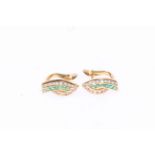 Pair 18 carat gold and emerald set earrings.