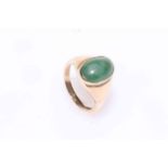 Gents 9 carat gold ring with green stone.