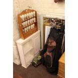 Golf bag and clubs, three pictures, two mirrors, spice rack and jars and wall cupboard.