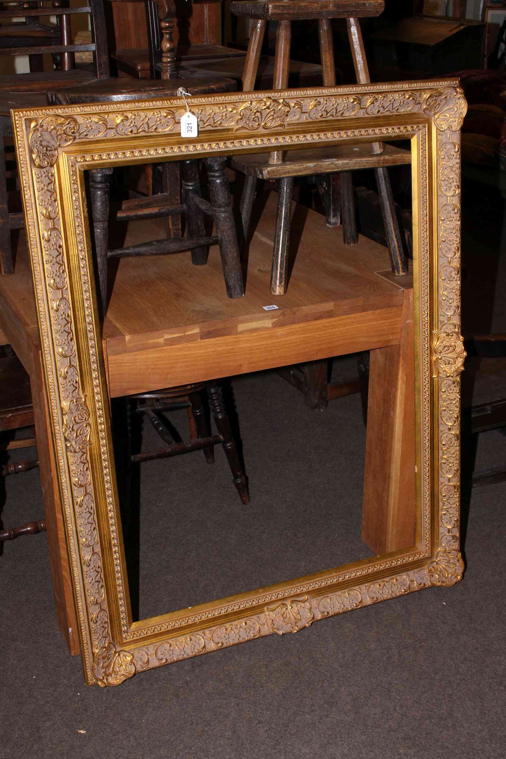 Large gilt picture frame, 125cm by 100cm.