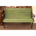 Painted metal and wood slat garden bench.