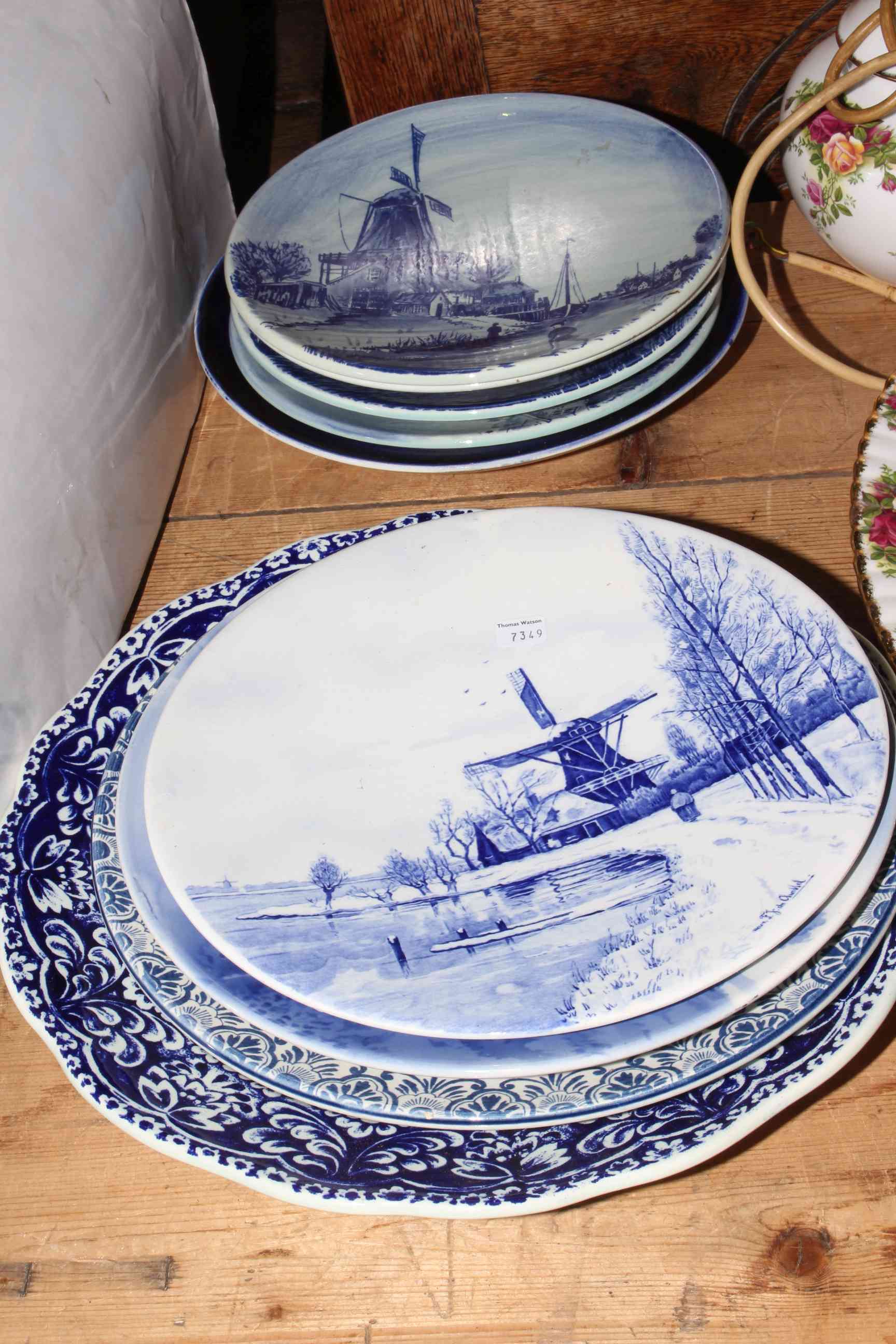 Collection of Delft blue and white plates.