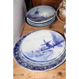 Collection of Delft blue and white plates.