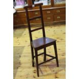 Early 19th Century mahogany ladder back child's correction chair.